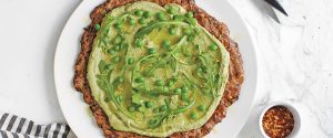 Zucchini Pizza Crust With Lemony Pea Pesto